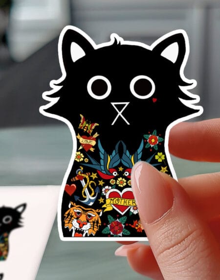 a vinyl sticker depicting a heavily tattooed black cat illustration