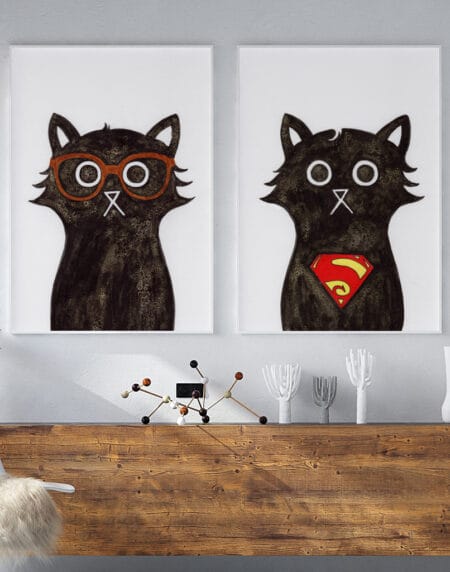 a diptych of two ink and salt black cat illustrations print, depicting Clark Kent and Superman
