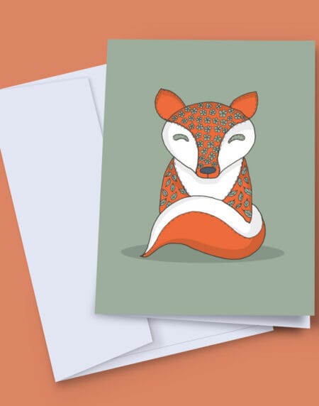 A 7x5 greeting card, with a gorgeous matt orange fox with floral fabric style detailing