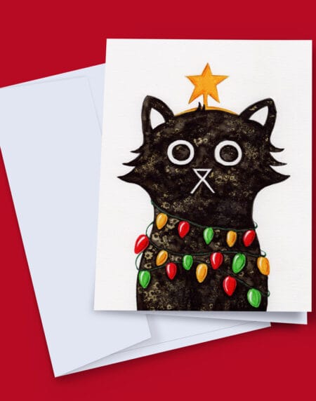 hand-illustrated salt and ink Christmas cat wrapped in Christmas lights, wearing a star on his head