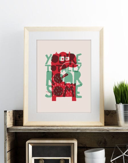 a typographic illustration print, featuring a cute monster, saying you're totally roar some, in red and turquoise