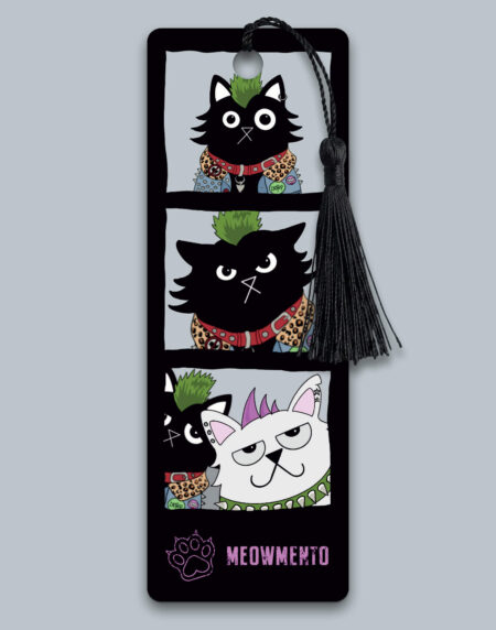 A black cat with a green mohawk poses in a photo booth strip — going from proud to irritated to bemused as a white cat photobombs the session. A punk cat bookmark on a black background with a black tassel, 52mm x 148mm, 400gsm matt laminated. Branded "Meowmento" at the bottom.